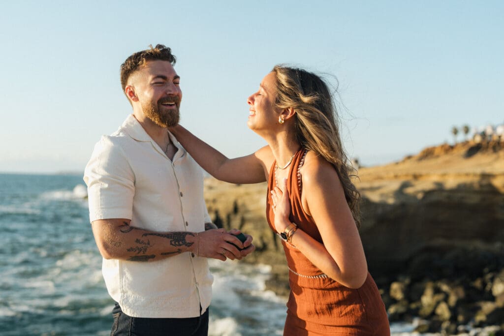 San Diego couples photographer capturing surprise proposal at Sunset Cliffs