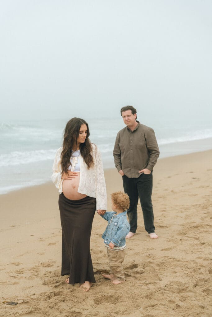 Family maternity photo ideas at Crystal Cove beach or at Calafia beach